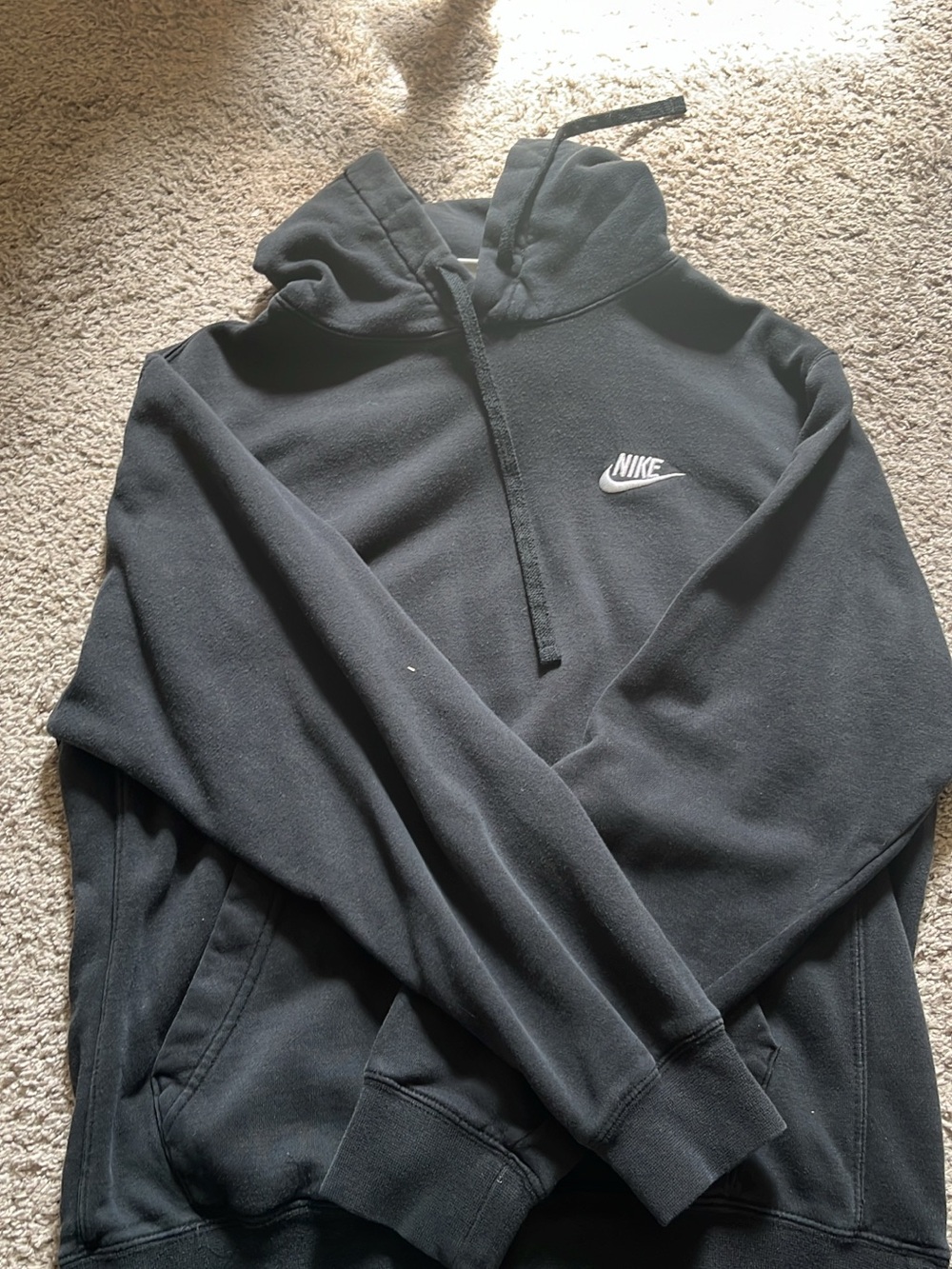 Nike Black Hoodie with White Swoosh Logo